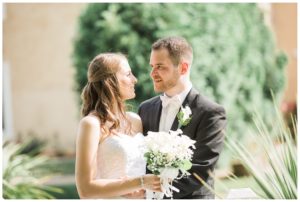 A romantic not posed shot of bride and groom during their wedding day at Villa Bianca in Seymour CT